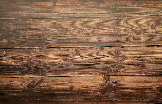 Sfondo orizzontale di legno di pino marrone con venature
