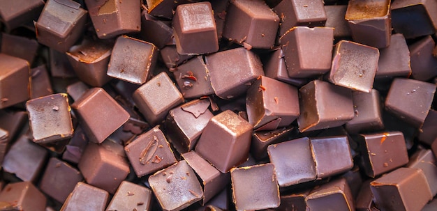 Sfondo Parti di cioccolato fondente fresco dal primo piano vista dall'alto Pezzo di cioccolato e sfondo di cacao