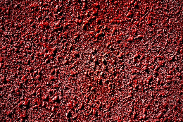 Sfondo rosso e astratto superficie irregolare rivestimento astratto Muro grunge texture con toni rossi Vintage grunge astratto rosso