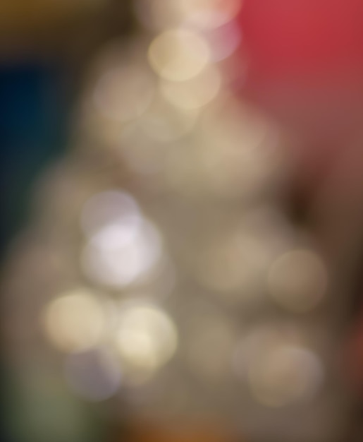 Sfondo sfocato delle luci di Natale. Bokeh chiaro astratto.