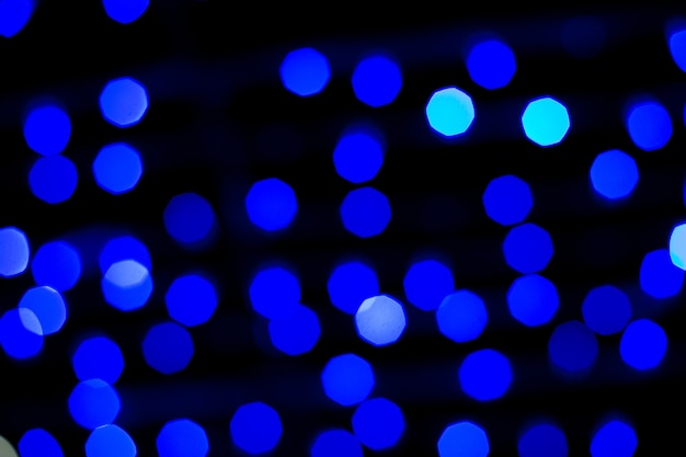 Sfondo sfocato di luci bokeh astratte blu e oro