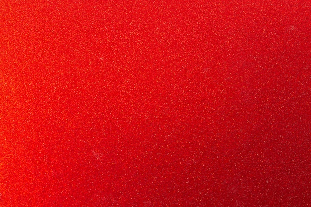 Sfondo texture glitter rosso, decorazione incandescente e foto del concetto di superficie natalizia