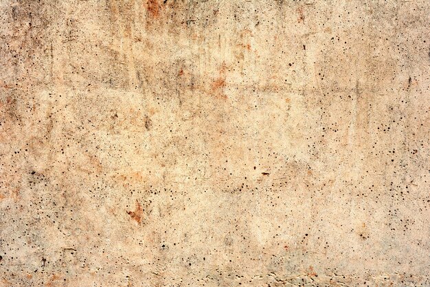 Sfondo texture muro di cemento. Frammento di muro con graffi e crepe