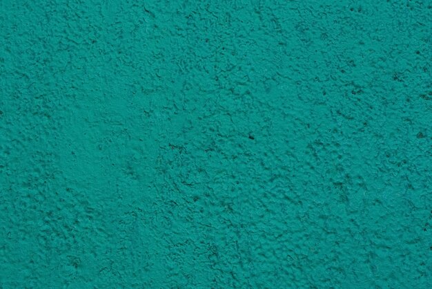 Sfondo verde astratto Bellissimo stucco verde con texture sul muro Sfondo da stucco verde