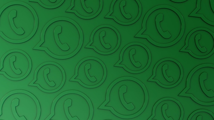 Foto sfondo verde con motivo logo whatsapp in rilievo