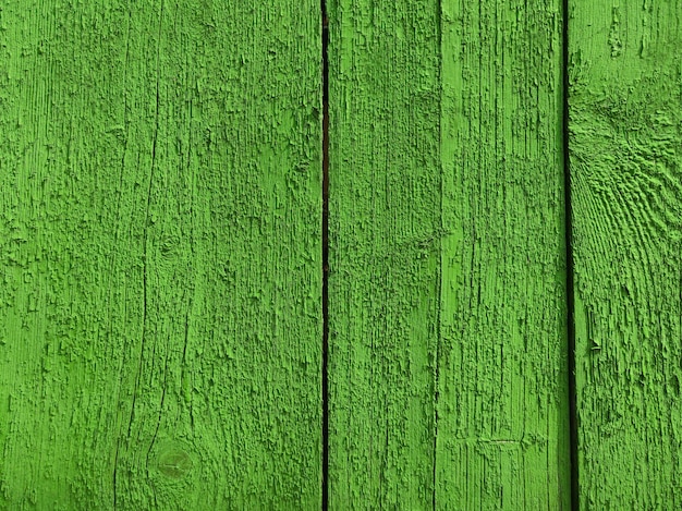 Sfondo verde e struttura in legno dipinto di legno naturale