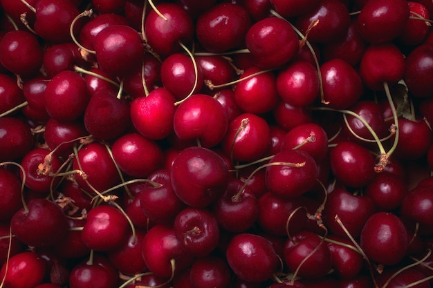 Sfondo vista dall'alto della trama di ciliegie dolci mature Primo piano di frutta