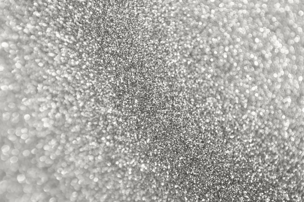 Sfuocatura astratta glitter argento sparkle bokeh sfocato sfondo chiaro