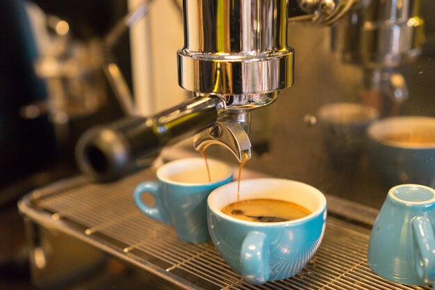 Sfuocatura di concetto di Portalifter della smerigliatrice della macchina di Barista Coffee Maker