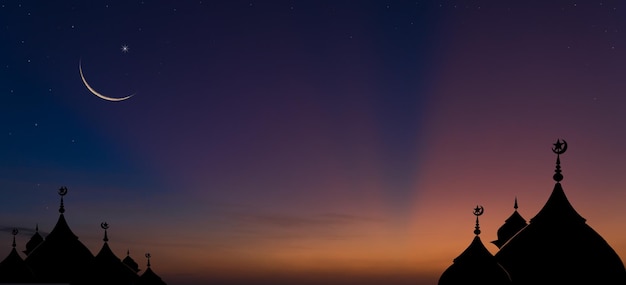 silhouette di moschee a cupola e luna crescente su sfondo crepuscolare del cielo al tramonto