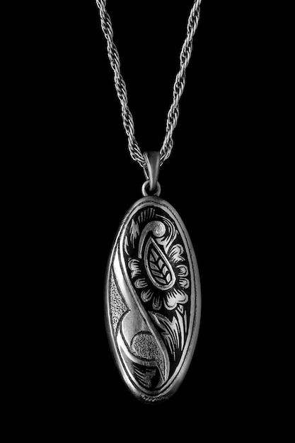 Silver necklace on black