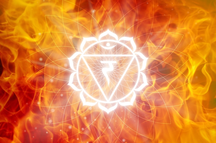 Simbolo di Manipura Chakra su uno sfondo di fuoco. Questo è il terzo Chakra, chiamato anche Il Plesso Solare