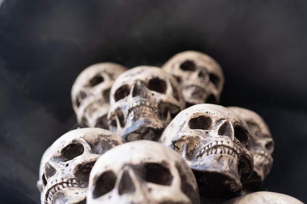 Skull Halloween Background Molte persone teschi stanno uno sopra l'altro Concetto mistico inquietante Memoriale occulto da incubo astratto