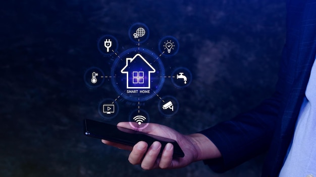 Smart home technology User touches virtual screen on smartphone manage smart home features including security lighting temperature Smart home and Iot concept