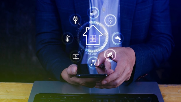 Smart home technology User touches virtual screen on smartphone manage smart home features including security lighting temperature Smart home and Iot concept