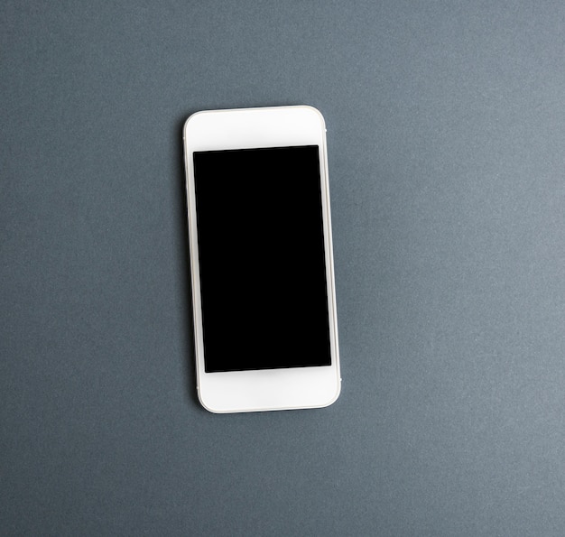 Smartphone bianco con schermo nero vuoto
