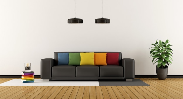 soggiorno moderno con cuscino colorato sul divano nero