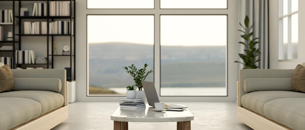 Soggiorno moderno e confortevole con comodo divano e tavolino finestrato con vista sulla natura