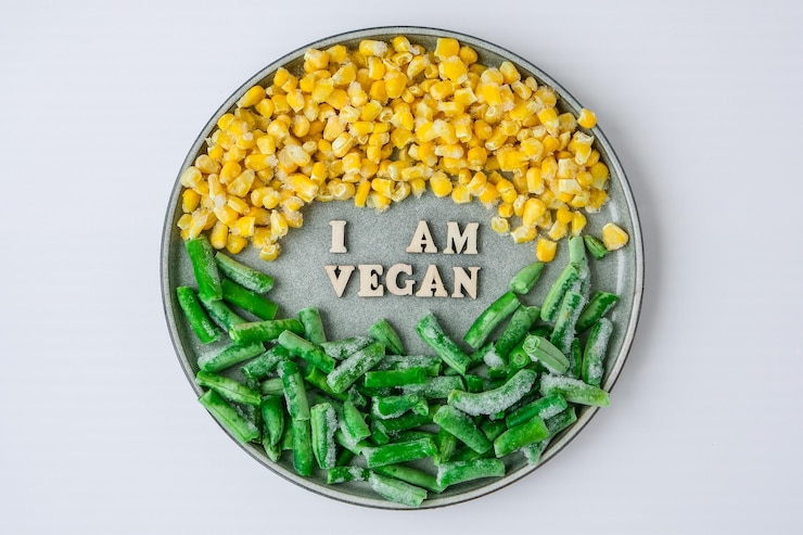 Foto sono vegano testo in piatto veganismo vegetariano stile di vita sano fagioli verdi mais giallo sano