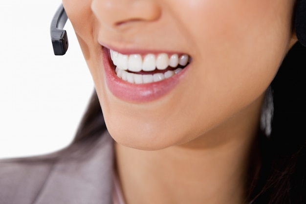 Sorriso dell&#39;agente del call center femminile