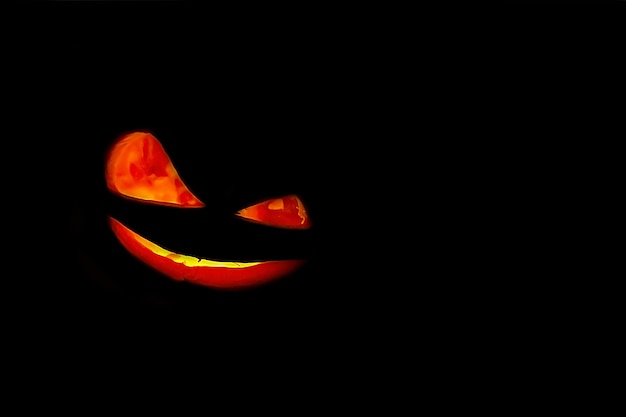 Sorriso di zucca di Halloween su sfondo nero