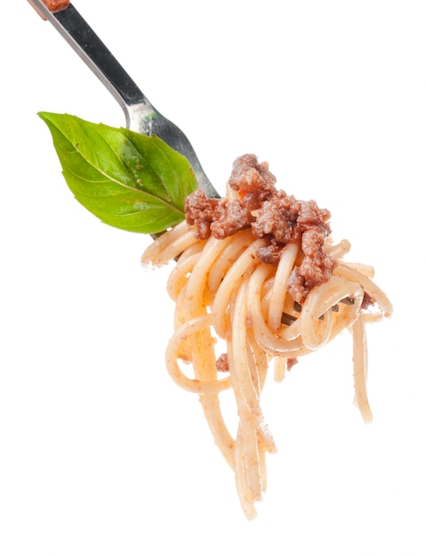 Spaghetti della pasta con salsa bolognese su una forcella