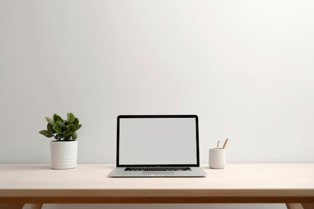 Spazio di lavoro sereno con laptop e piante succulente sulla scrivania minimalista IA generativa