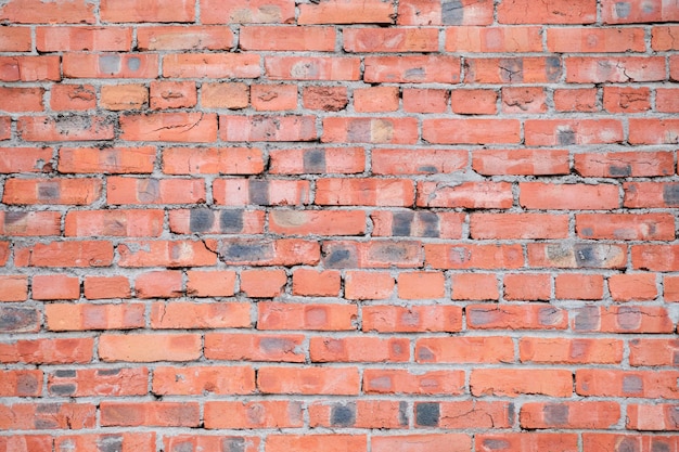 Spazio rosso di struttura del muro di mattoni