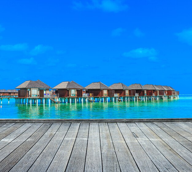 Spiaggia con bungalow sull'acqua Maldive