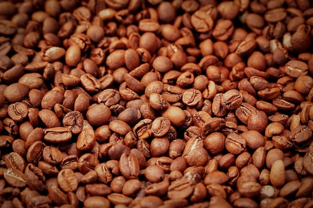 Spilli di chicchi di caffè marrone arrostiti