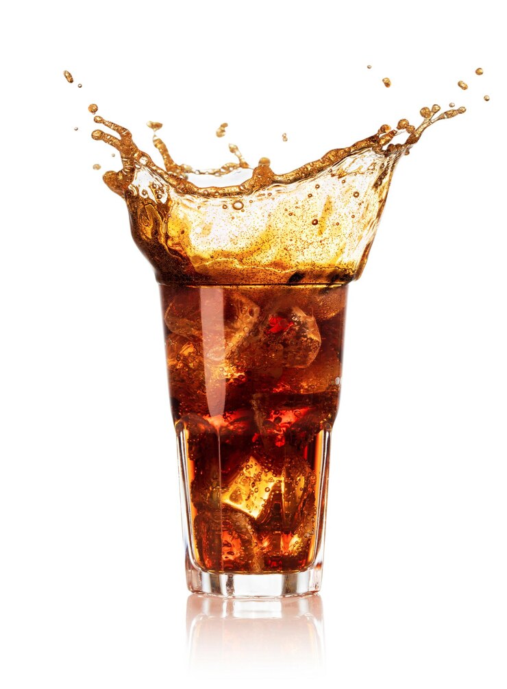 Spruzzare in un bicchiere di cola