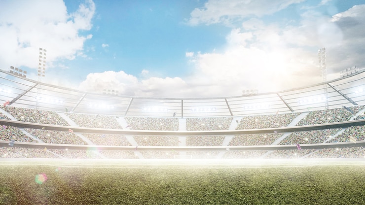 Foto stadio diurno sotto il sole con luci