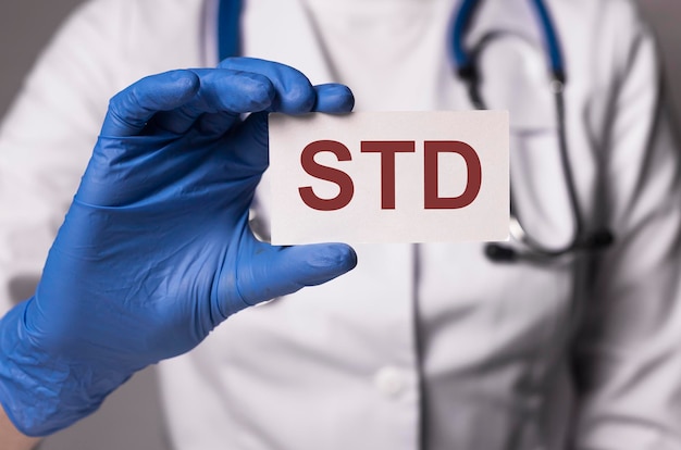 STD acronimo, parola. Malattia medica nelle mani del medico