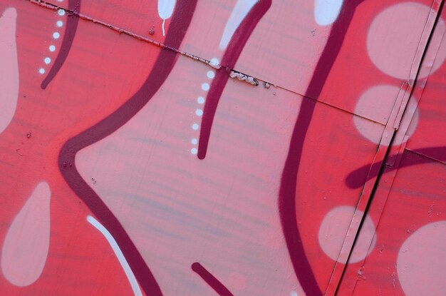 Street art Immagine di sfondo astratta di un frammento di un dipinto di graffiti colorato nei toni del rosso