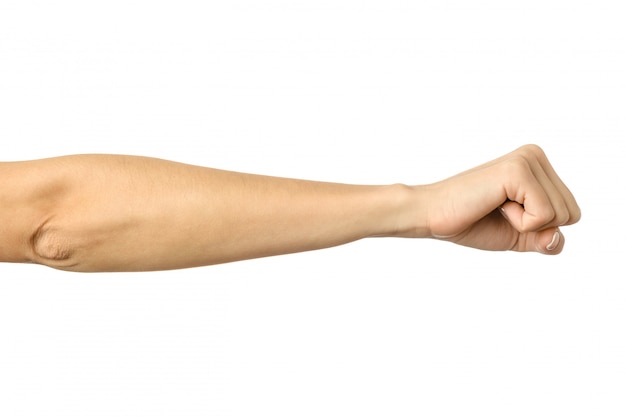 Stretto a mano in un pugno. Gesturing della mano della donna isolato su bianco