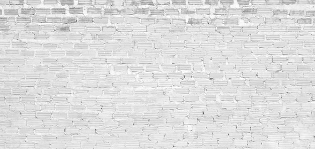 Struttura astratta del muro di mattoni bianchi per lo sfondo del motivo