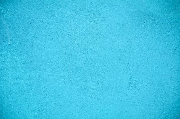Struttura blu della parete del cemento - primo piano