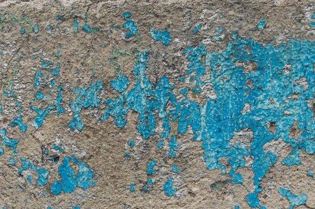 Struttura blu della parete della pittura della vecchia buccia concreta d'annata