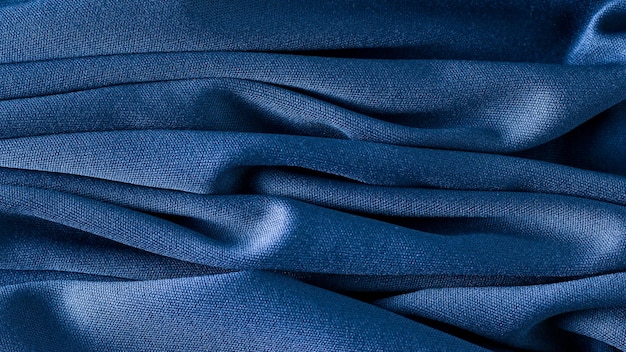 struttura blu della priorità bassa del panno del tessuto
