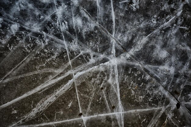 struttura del ghiaccio incrinato, sfondo freddo invernale stagionale astratto, ghiaccio naturale, ghiaccio rotto su un lago