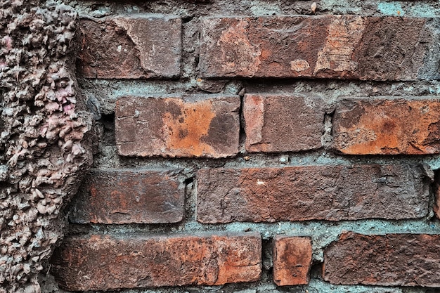 Struttura del vecchio primo piano rosso del muro di mattoni