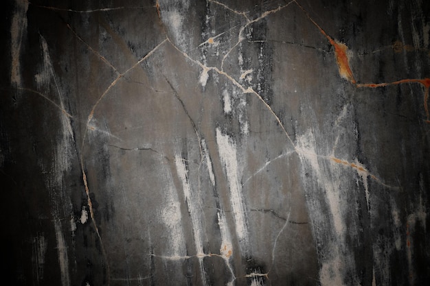 Struttura della parete di cemento scuro per vecchie pareti di fondo piene di graffi e macchie