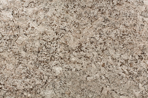 Struttura della superficie in granito beige e marrone