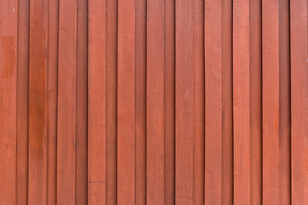 Struttura di legno rossa, tavole di legno, superficie di legno per fondo e carta da parati