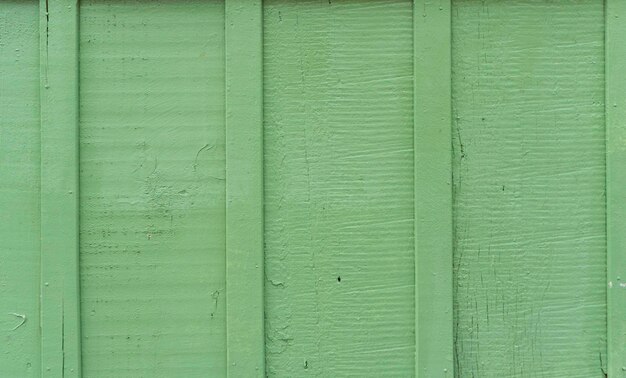 Struttura di legno rustica invecchiata del fondo in verde.