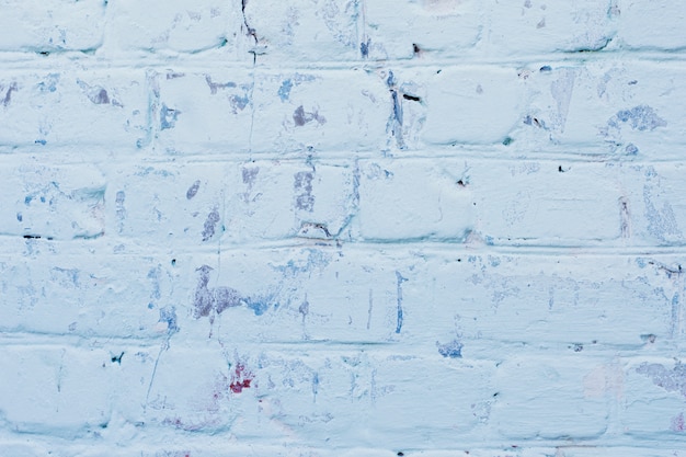 Struttura di vecchia superficie blu del muro di mattoni con le cuciture del cemento