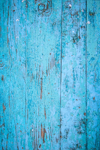 Struttura in legno, vecchie tavole con vernice blu scrostata