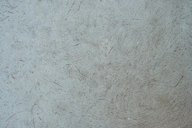Struttura in marmo astratto di colore chiaro Fondo di struttura della parete di cemento di pietra