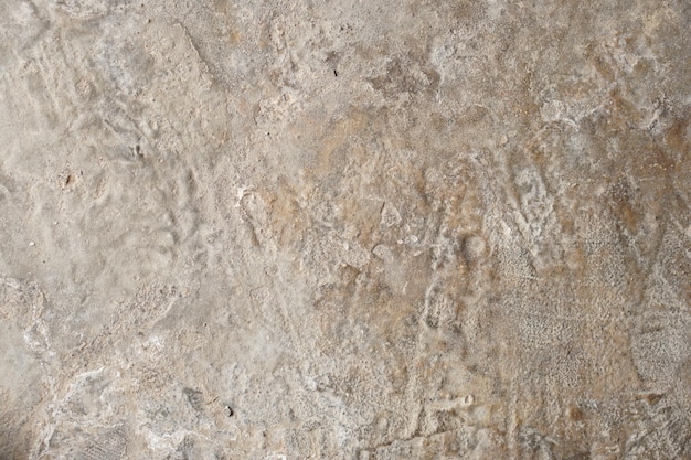 Struttura in marmo astratto di colore chiaro Fondo di struttura della parete di cemento di pietra