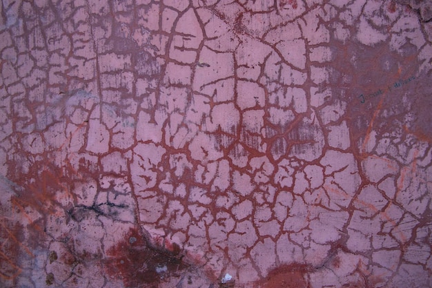 Struttura rossa della parete di lerciume Fondo rosso di lerciume